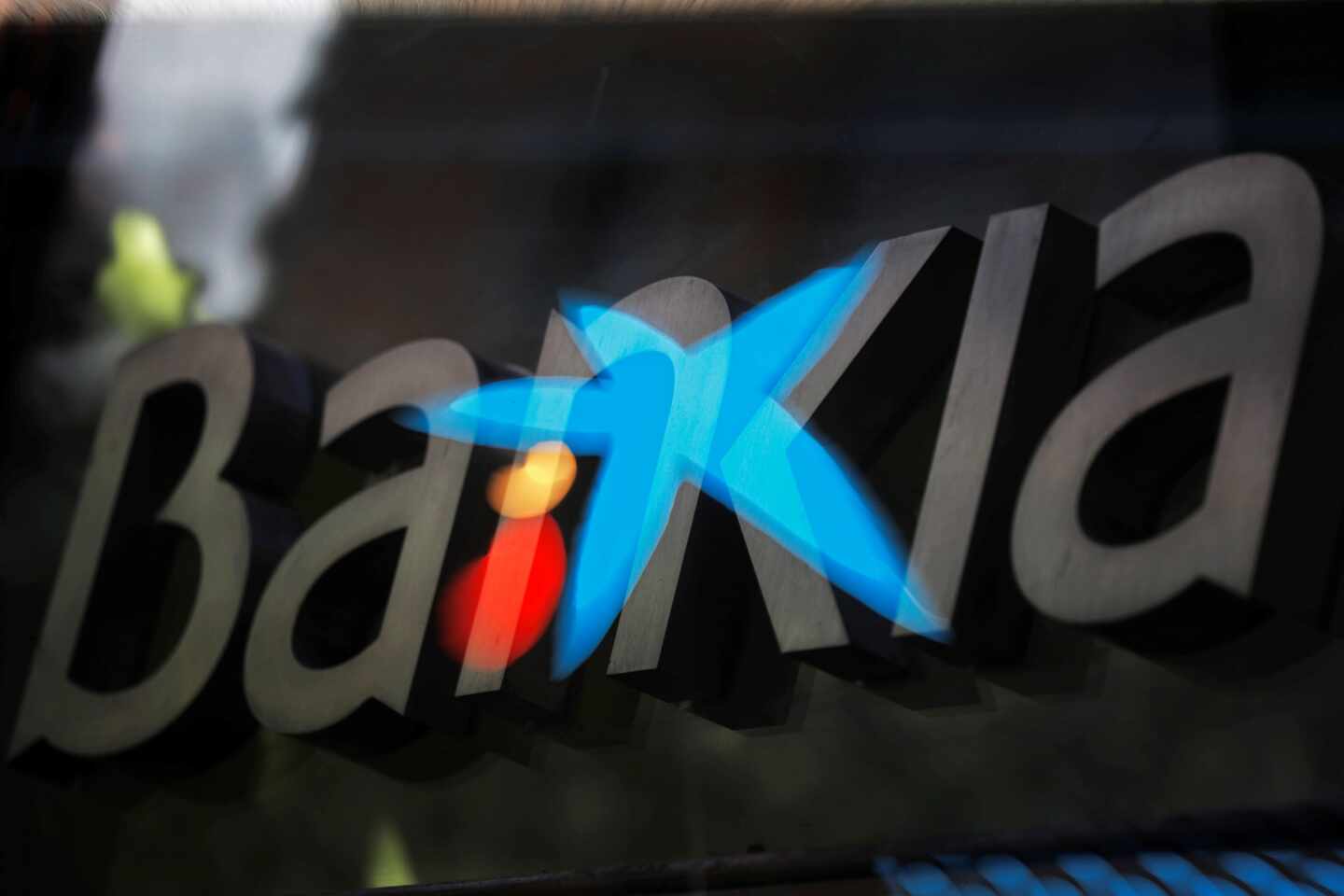 Los logotipos de Bankia y CaixaBank