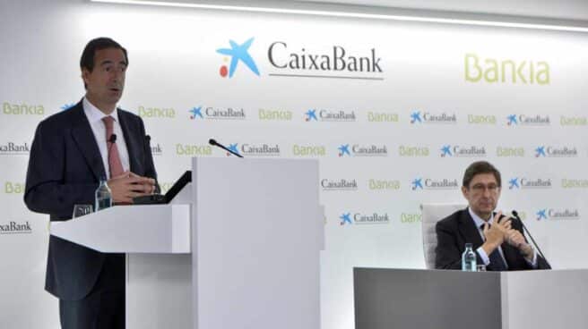 El presidente de Bankia, José Ignacio Goirigolzarri, y el consejero delegado de CaixaBank, Gonzalo Gortázar, presentan la nueva entidad.