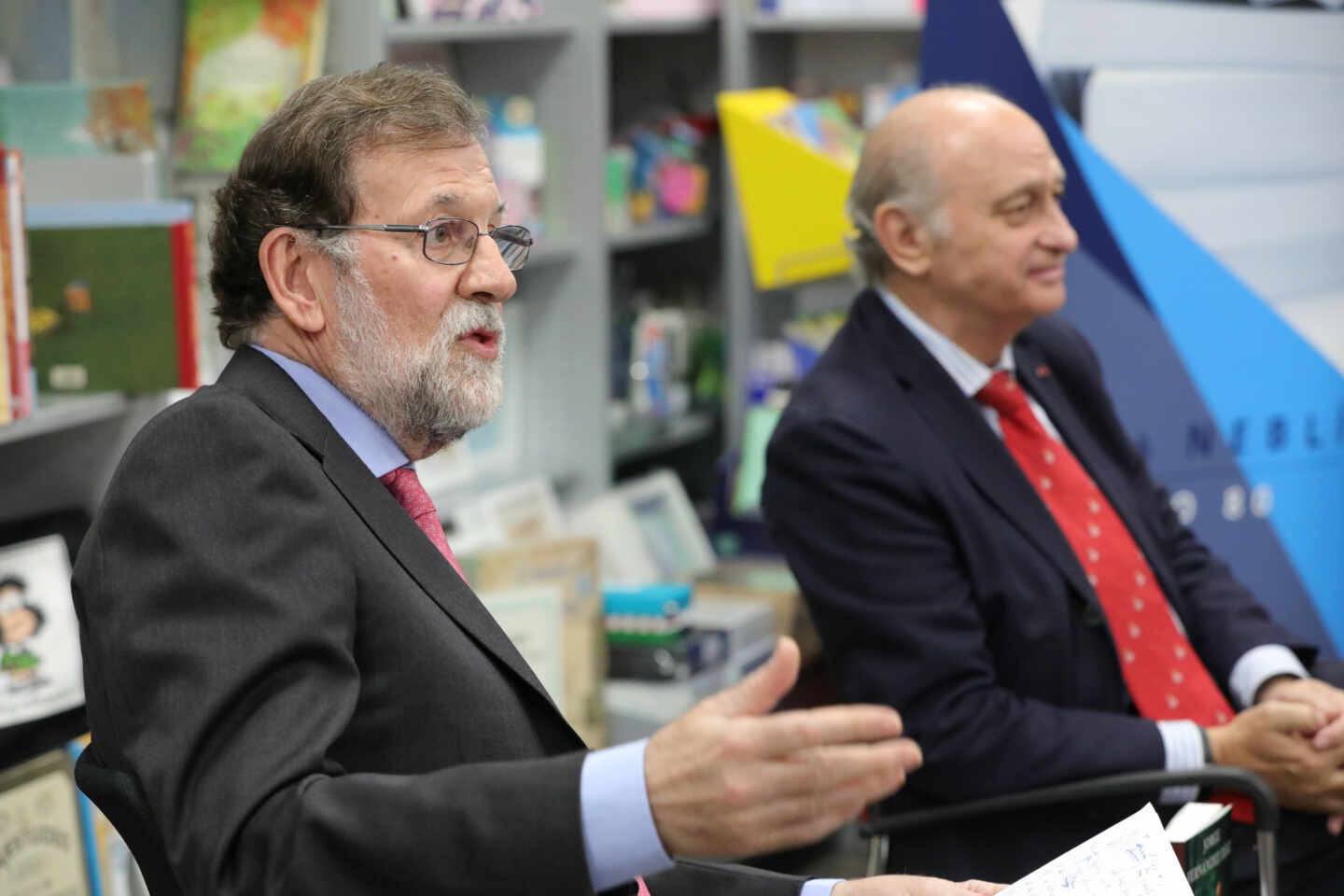 Mariano Rajoy y Fernández Díaz, en la presentación del libro de memorias de éste en 2019.