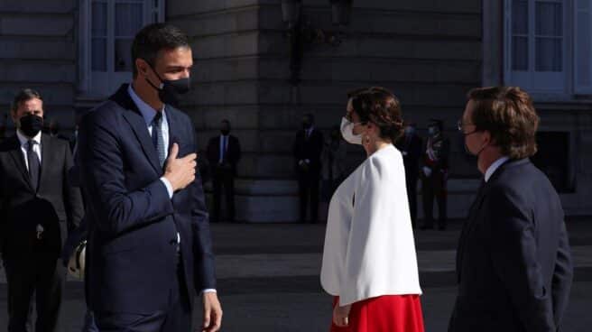 Pedro Sánchez e Isabel Díaz Ayuso, en los actos del 12 de octubre.