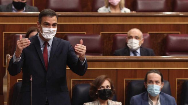 Pedro Sánchez, Carmen Calvo y Pablo Iglesias, en el Congreso de los Diputados.