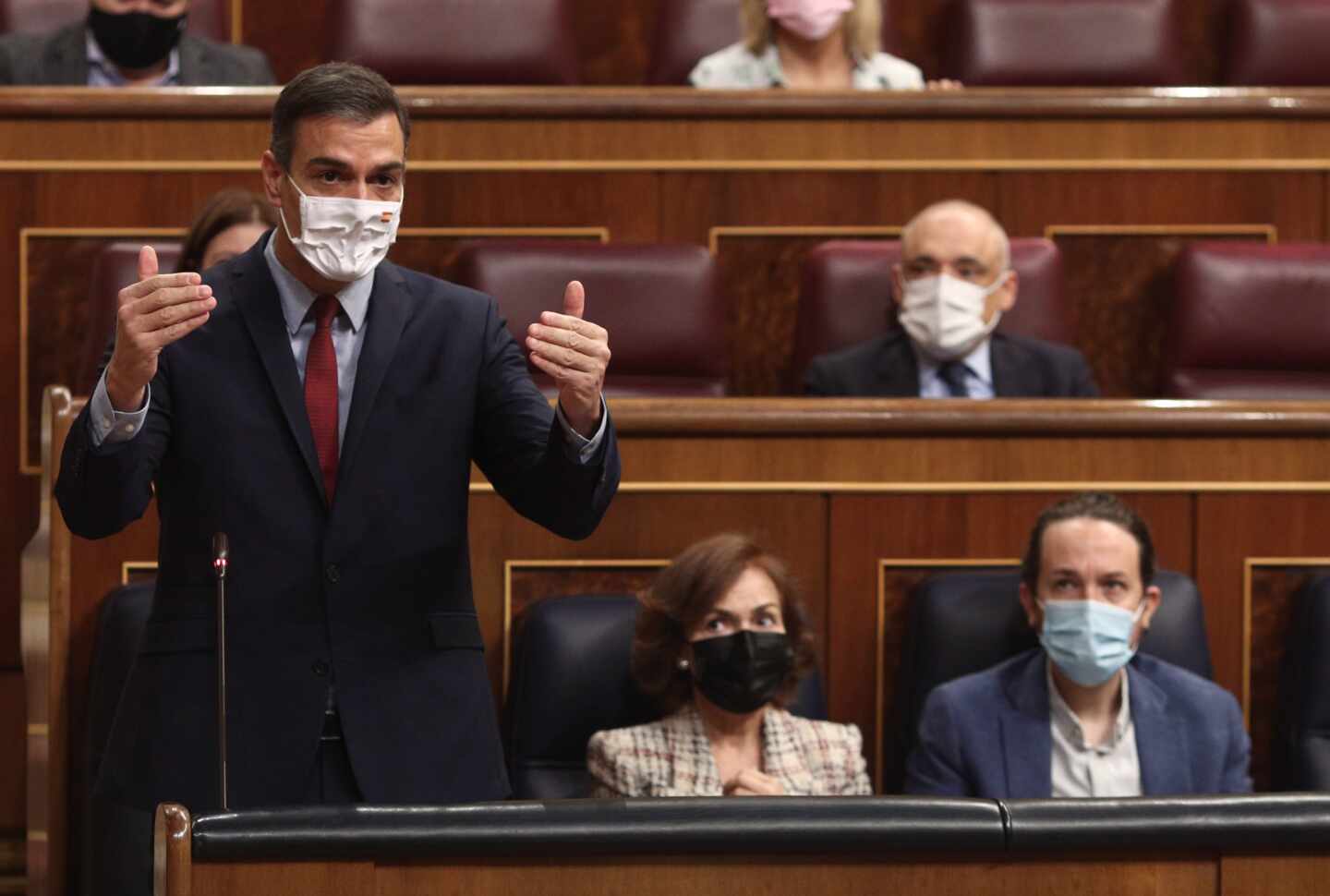 Pedro Sánchez, Carmen Calvo y Pablo Iglesias, en el Congreso de los Diputados.