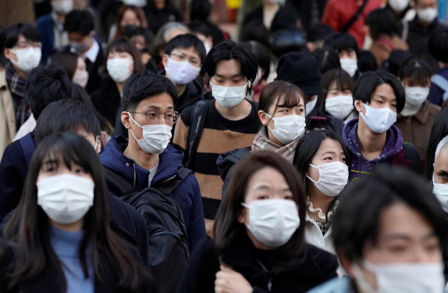 Ciudadanos de Tokio (Japón) con mascarilla.