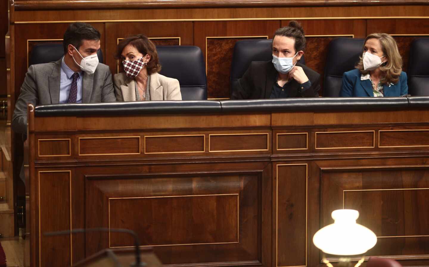 Pedro Sánchez, Carmen Calvo, Pablo Iglesias y Nadia Calviño, en el Congreso de los Diputados.