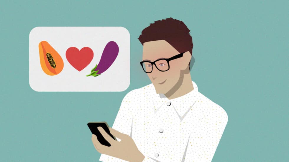 Imagen de un chico ligando con una app de la que sale un bocadillo con una papaya, un corazón y una berenjena