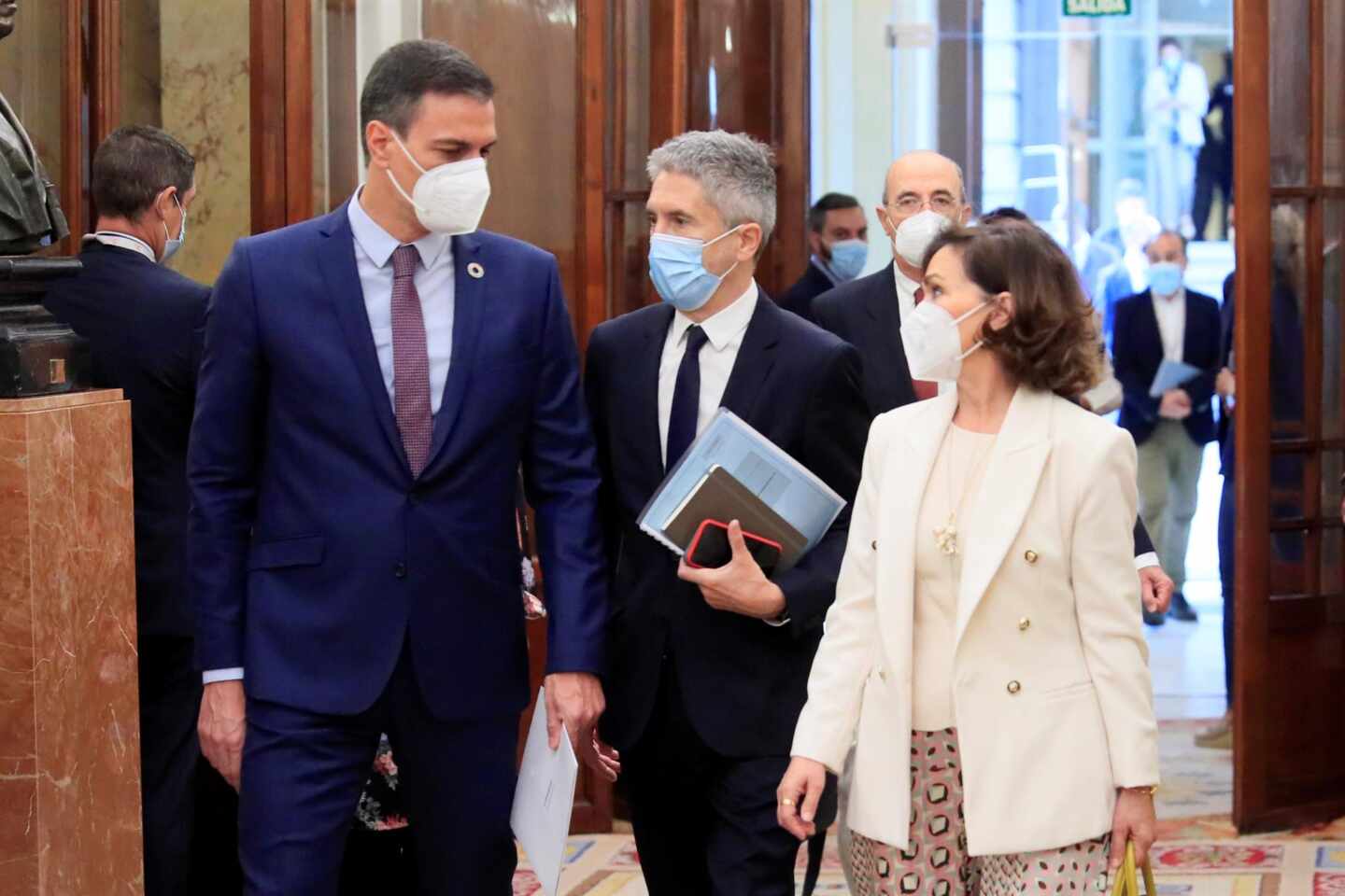 Pedro Sánchez, Fernando Grande-Marlaska y Carmen Calvo, en el Congreso de los Diputados.