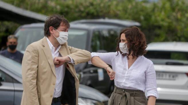 La presidenta de la Comunidad, Isabel Díaz Ayuso, y el presidente de la Junta de Castilla y León, Alfonso Fernández Mañueco.