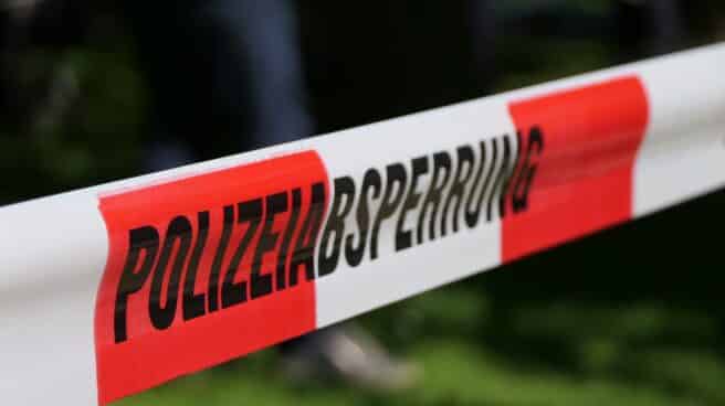 policia-alemana-atacante Imagen de archivo.