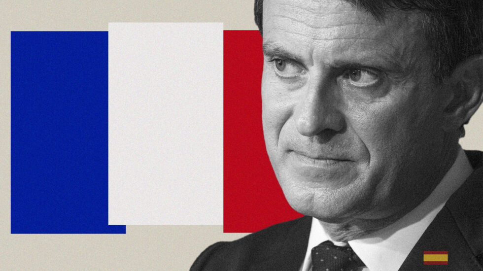 Imagen de Manuel Valls con la bandera de Francia de fondo