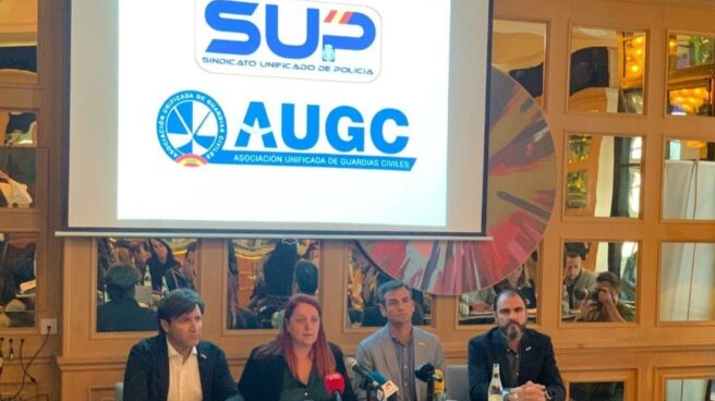 Representantes del SUP y la AUGC, en Madrid.