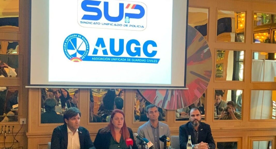 Representantes del SUP y la AUGC, en Madrid.