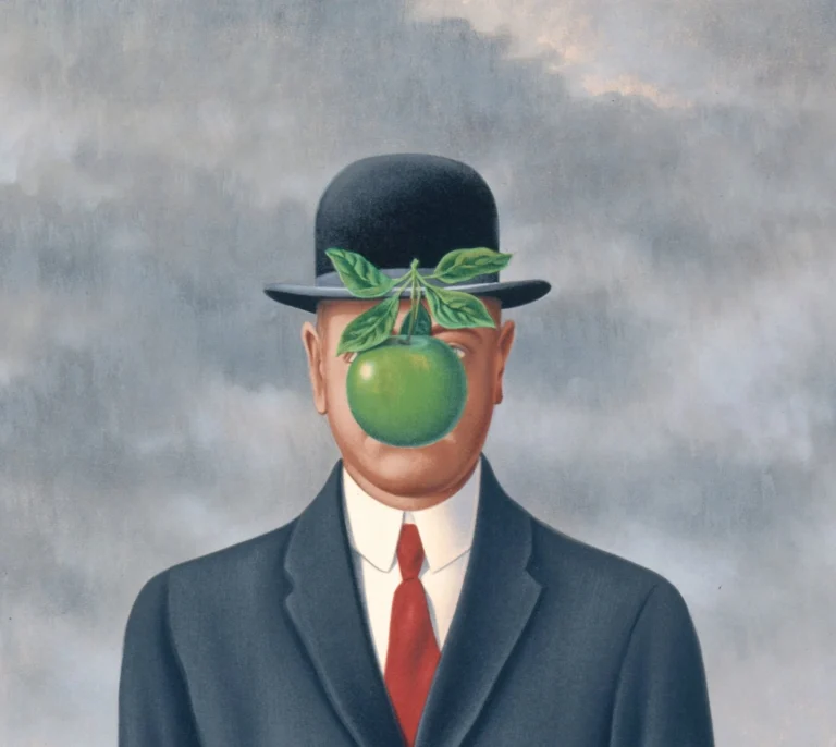 René Magritte, el surrealista de las manzanas y palomas como máscaras