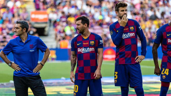 Ernesto Valverde, along with Leo Messi and Gerard Pique, when he was the coach of Barcelona Football Club.