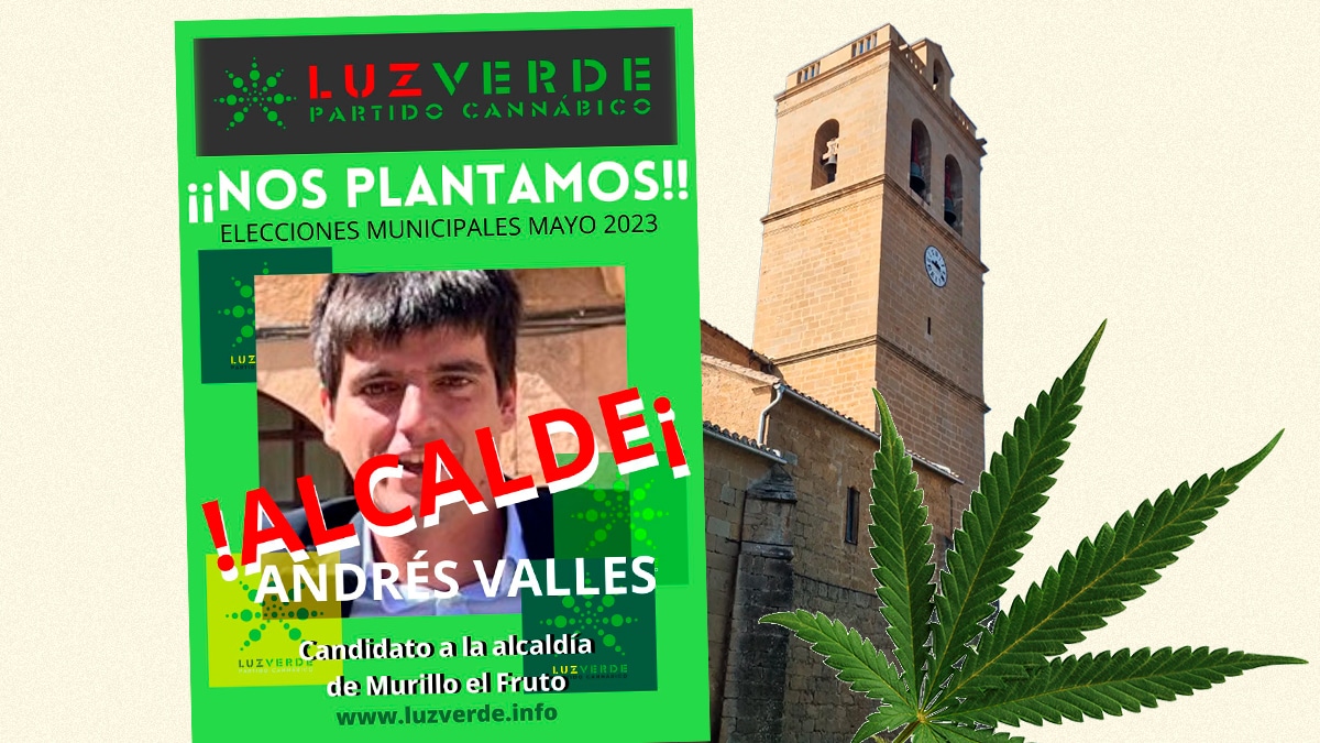 Cartel de la candidatura cannábica de Murillo el Fruto junto a su iglesia.