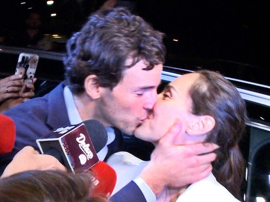 Inigo Oniev and Tamara Falko kiss before the wedding.