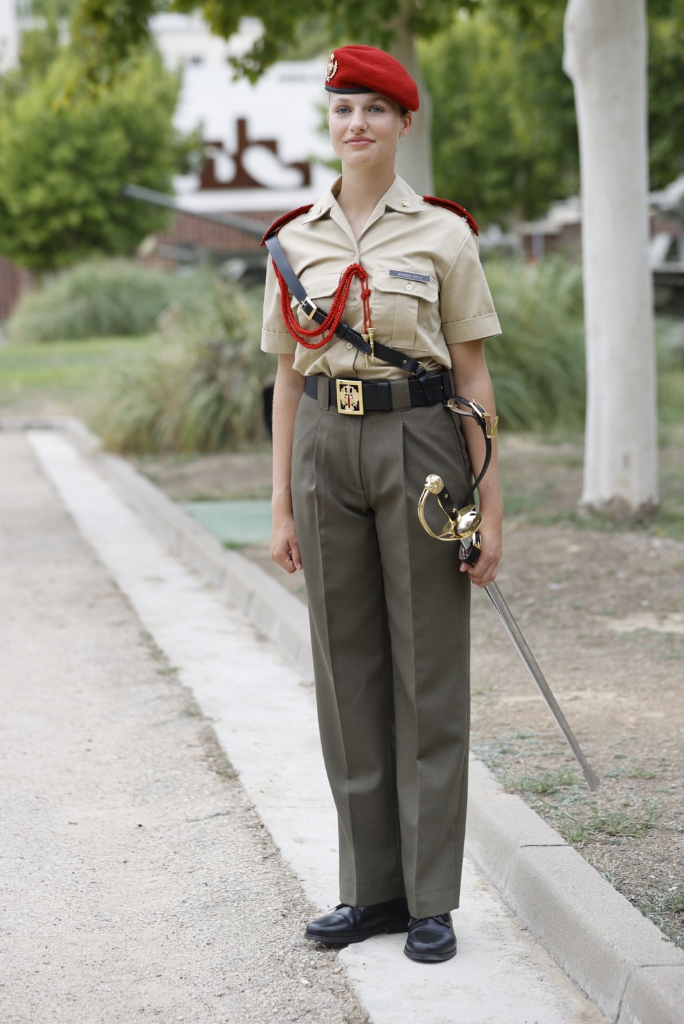 Princess Leonor in full uniform, including saber, after her cadet status ceremony.