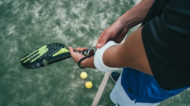 man playing padel tennis