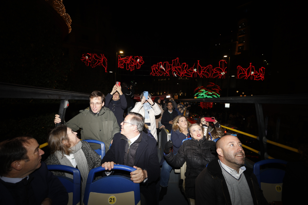 El alcalde de Madrid, José Luis Martínez-Almeida (3i), durante el acto de encendido de la iluminación navideña de Madrid, este jueves. 