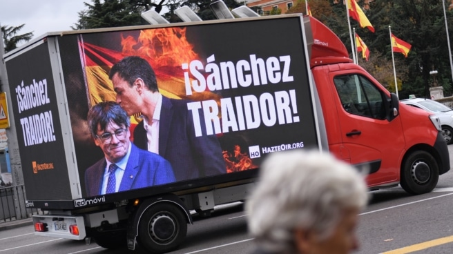 Cartel contra Sánchez y Puigdemont en Madrid.