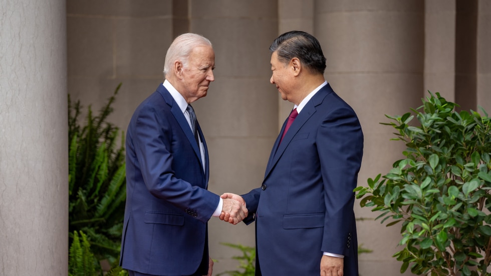 Joe Biden saluda a Xi Jinping en Woodside