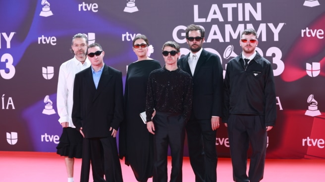 Singer Sen Senra poses during a photo call before the Latin Grammy Awards.