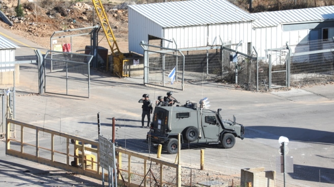 Action at the Ofer crossing in Israel before the exchange of Israeli hostages held by Hamas for Palestinian prisoners