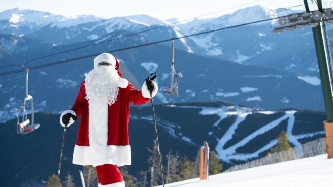 Man dressed as Santa Claus at ski resort