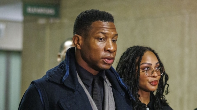 American actor Jonathan Majors (left) arrives in court as jury deliberations continue in New York.