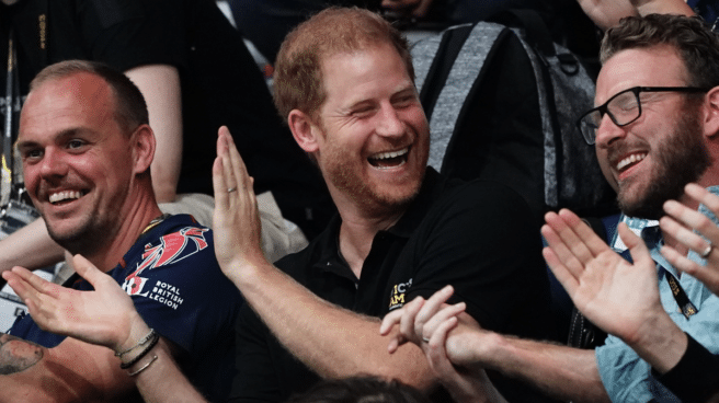Prince Harry applauds at the Invictus Awards ceremony in Germany last September.