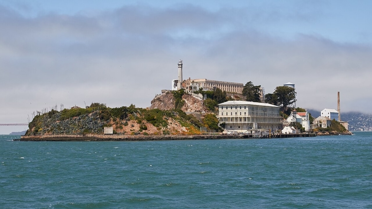 Alcatraz Island as seen from the East. The small island in the San Francisco Bay was developed with facilities for a lighthouse, a military fortification, and a prison. It received designation as a National Historic Landmark in 1986.