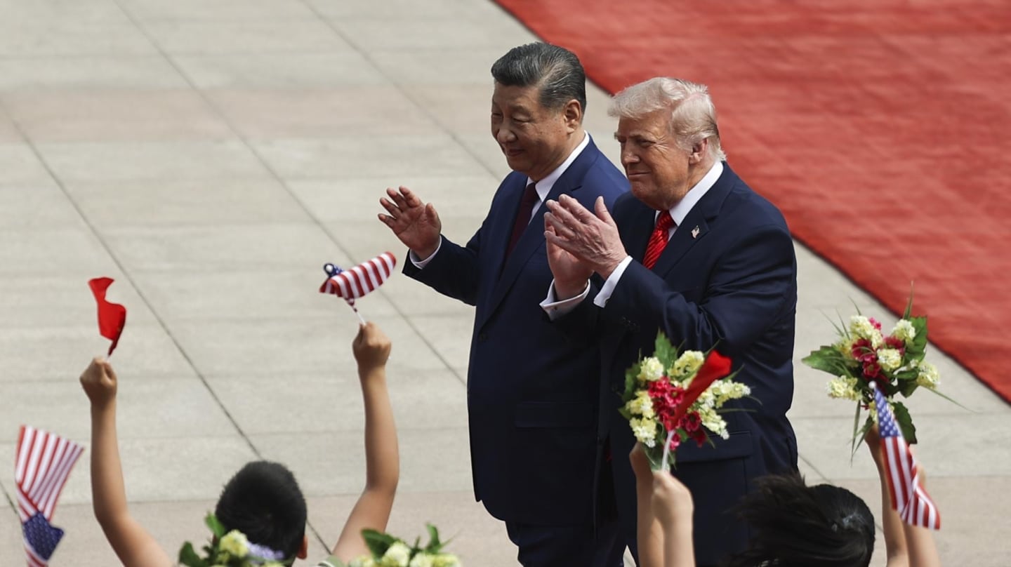 Xi Jinping y Donald Trump aclamados en el Gran Salón del Pueblo, en Pekín.