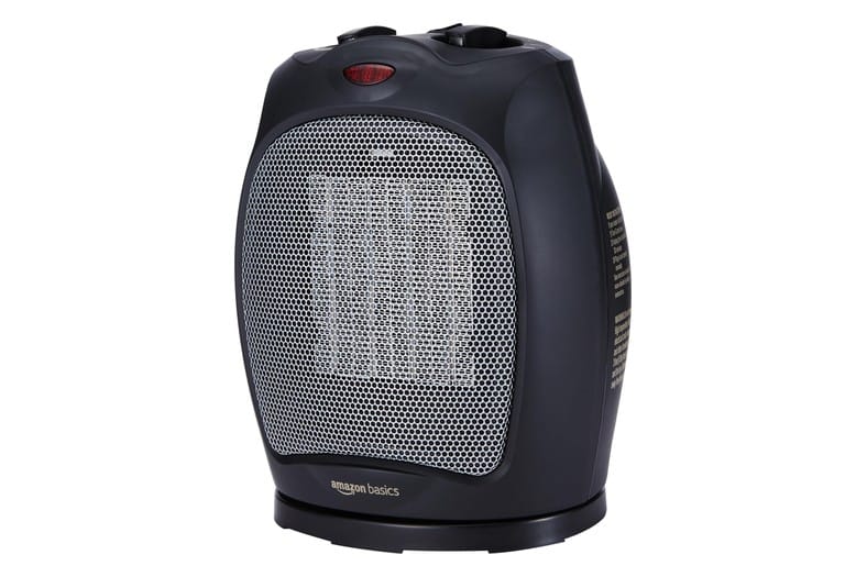 Calefactor cerámico oscilante Amazon Basics DQ078 en color negro, con asa de transporte, para uso doméstico