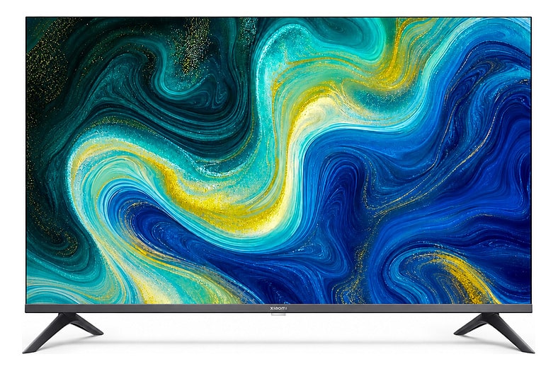 Televisor Xiaomi TV Pro de 43 pulgadas 4K QLED con marco fino y pantalla encendida sobre peana